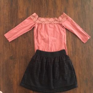 Off the shoulder lace Rue 21 top. Black skirt.